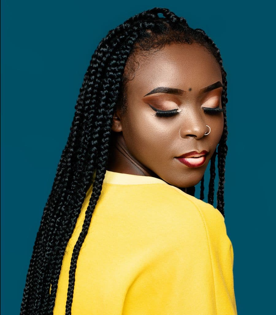 Editorial portrait with sleek box braids